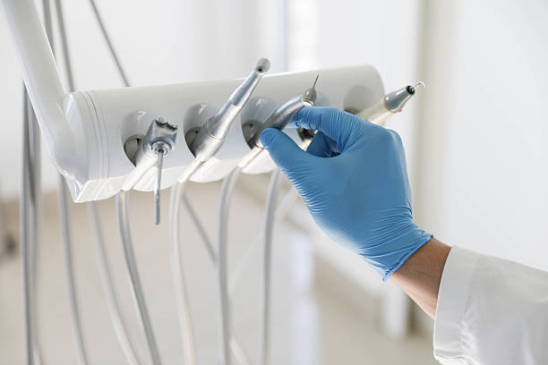 Professional Tooth Extraction technician working in Santa Cruz, CA